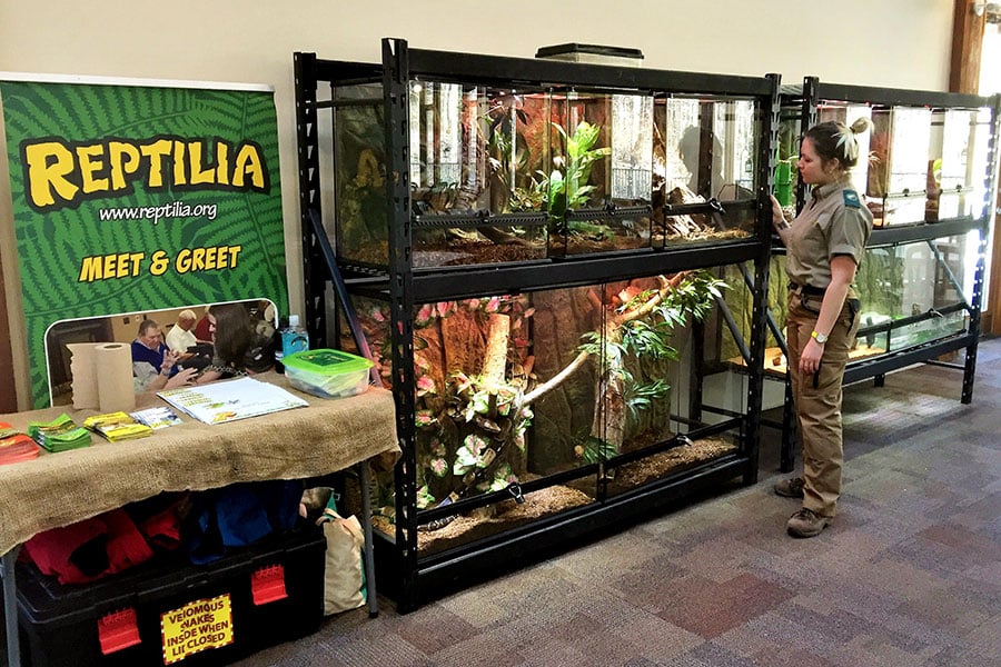 Reptilia Mobile Zoo display with host standing in front